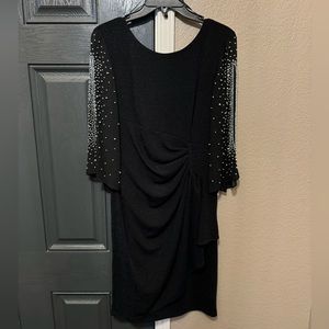 Stunning in person. Only worn for a few hours. Size 8 cocktail dress